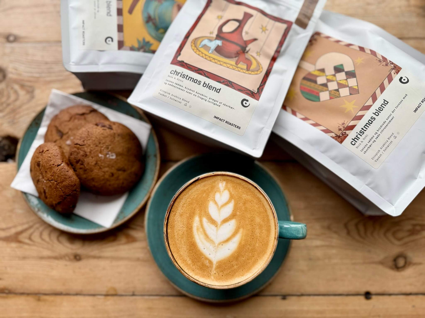 Impact Roasters Christmas Coffee Blends with Latte and cookies